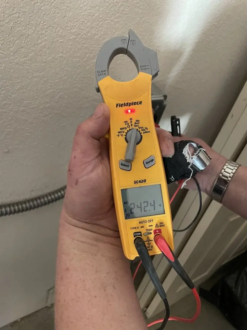 Voltage testing with clamp meter during Hot Tub / Pool Electrical Wiring in Chartiers